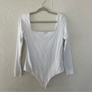 Nuuds Women’s White Long Sleeve Body Suit. Size Large